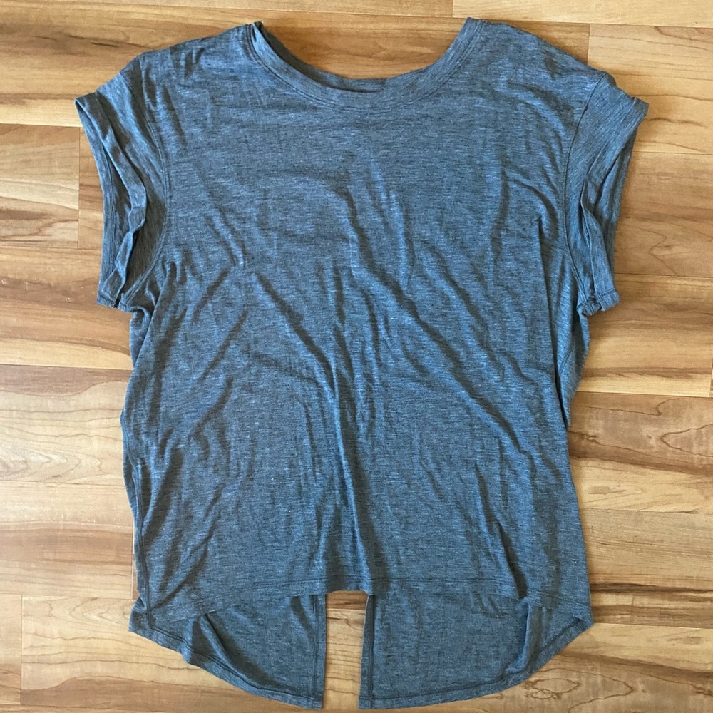 Lululemon top with slit back - size 4